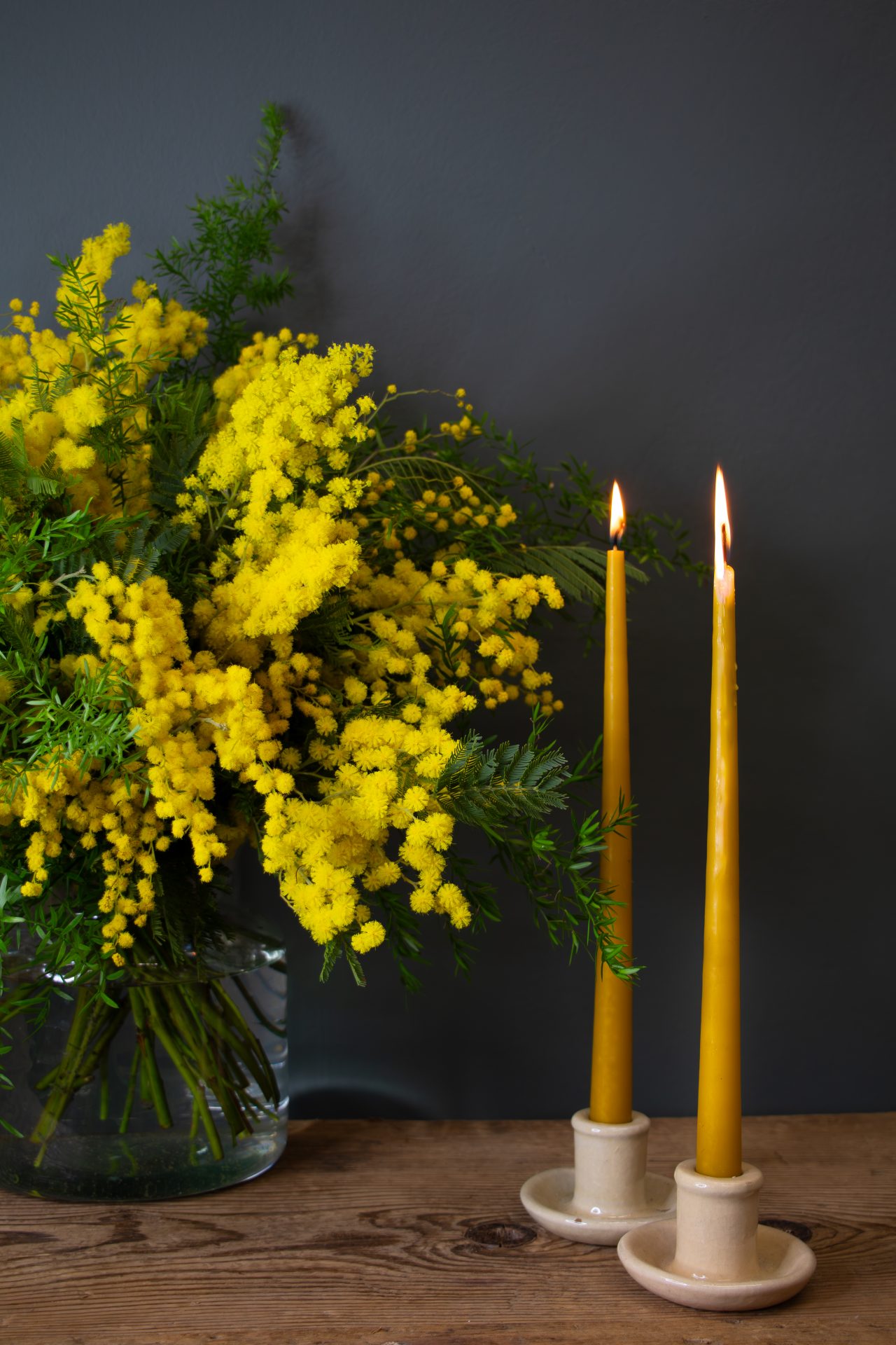 mimosa and yellow candles