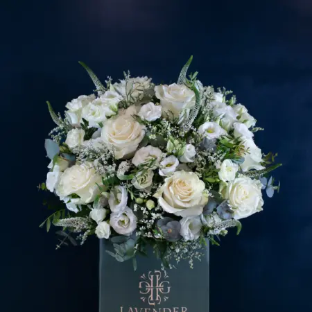 Graduation Bouquet - Roses, Lisianthus, Limonium and Veronica with mixed seasonal foliage